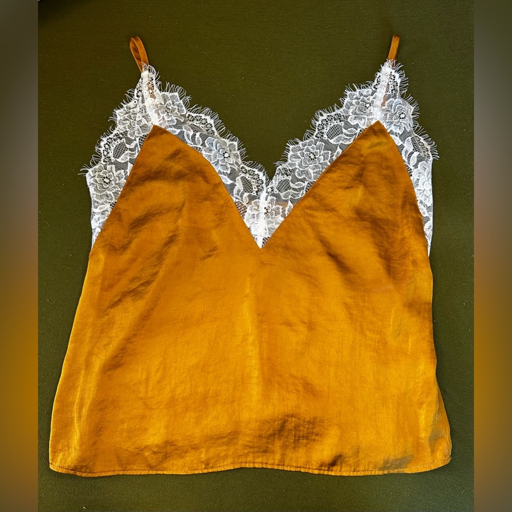 Light lacy deep V tank.